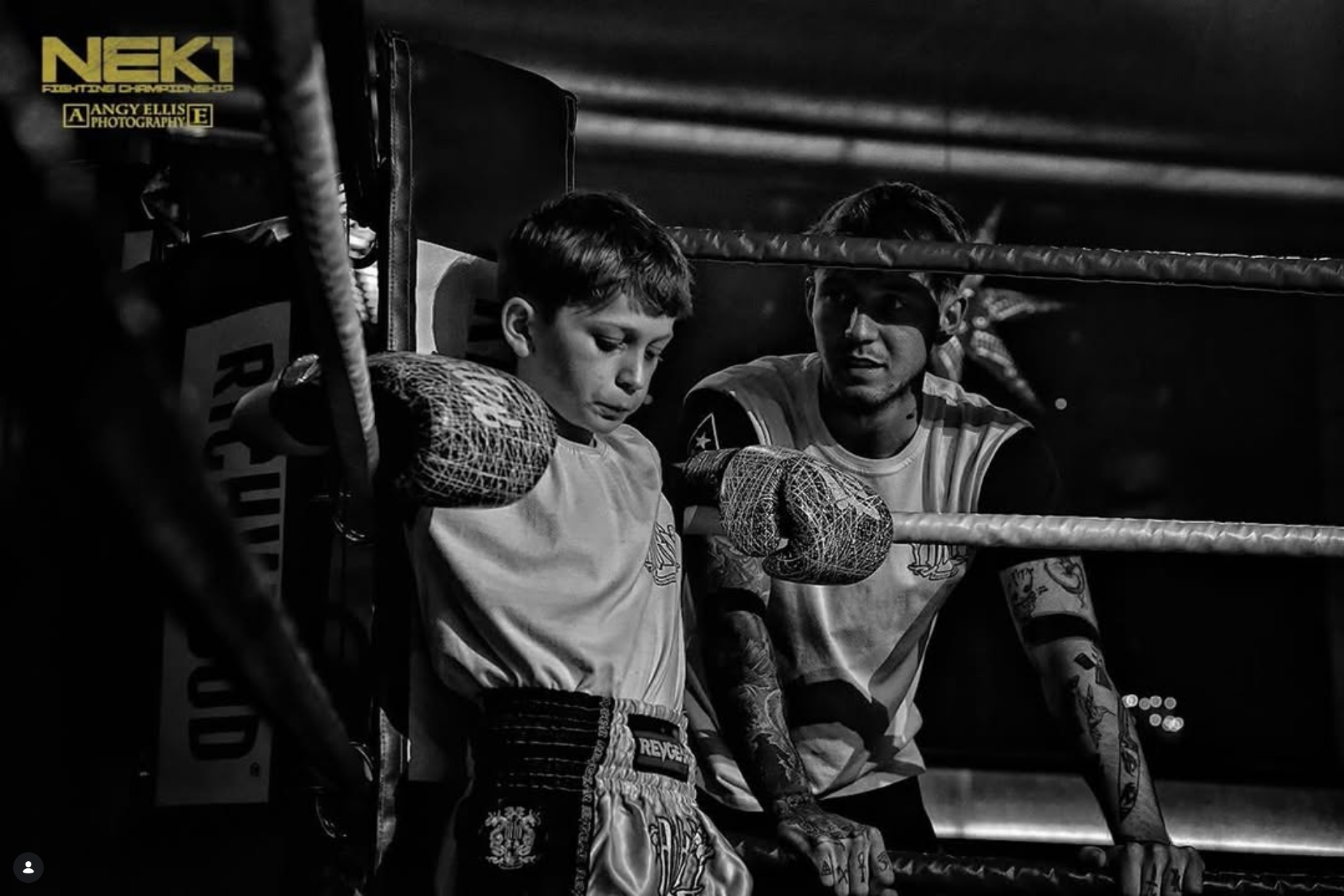 Coach Cam with a young fighter